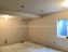 Basement remodel in Lee's Summit Missouri installation of drywall panels on sound proof ceilings and walls in the music studio 